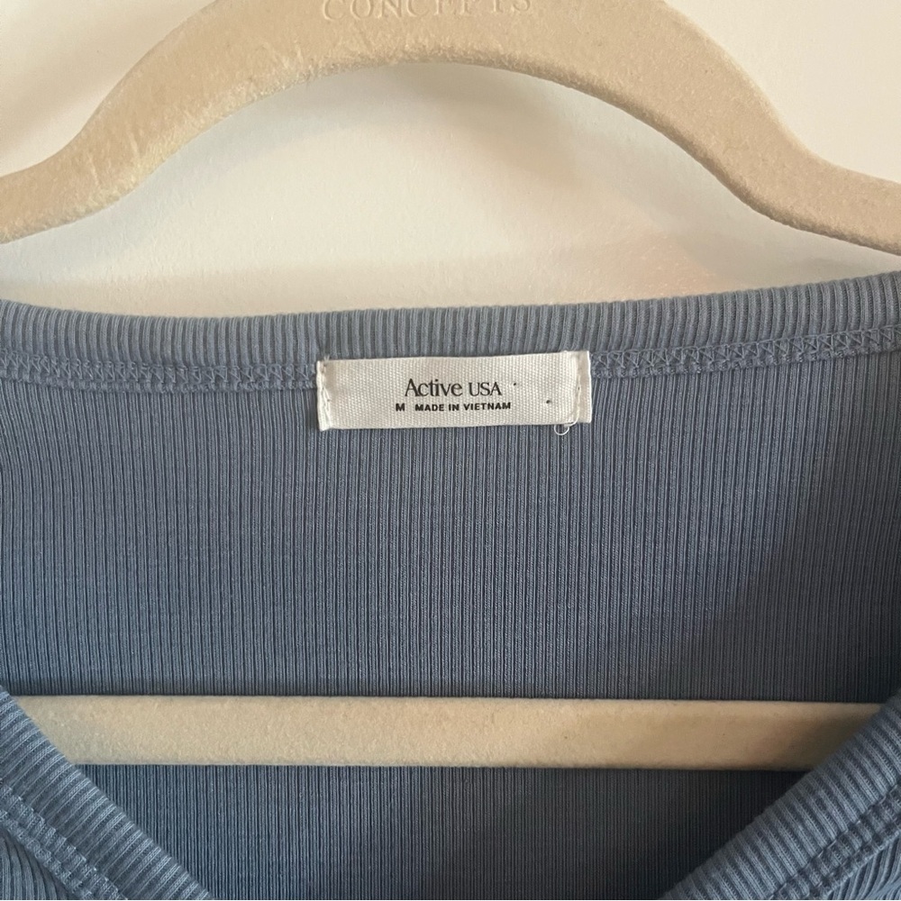 Active USA button down light blue short sleeve crop top. Women’s size Medium. - Picture 4 of 4
